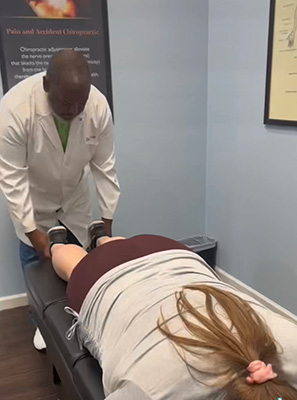 Chiropractor Winder GA Torey Evans Adjusting Patient